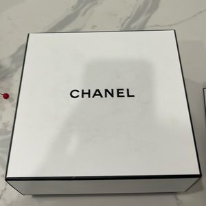 Chanel box 9x9” with Chanel bag 8x10” includes Chanel pink ribbon